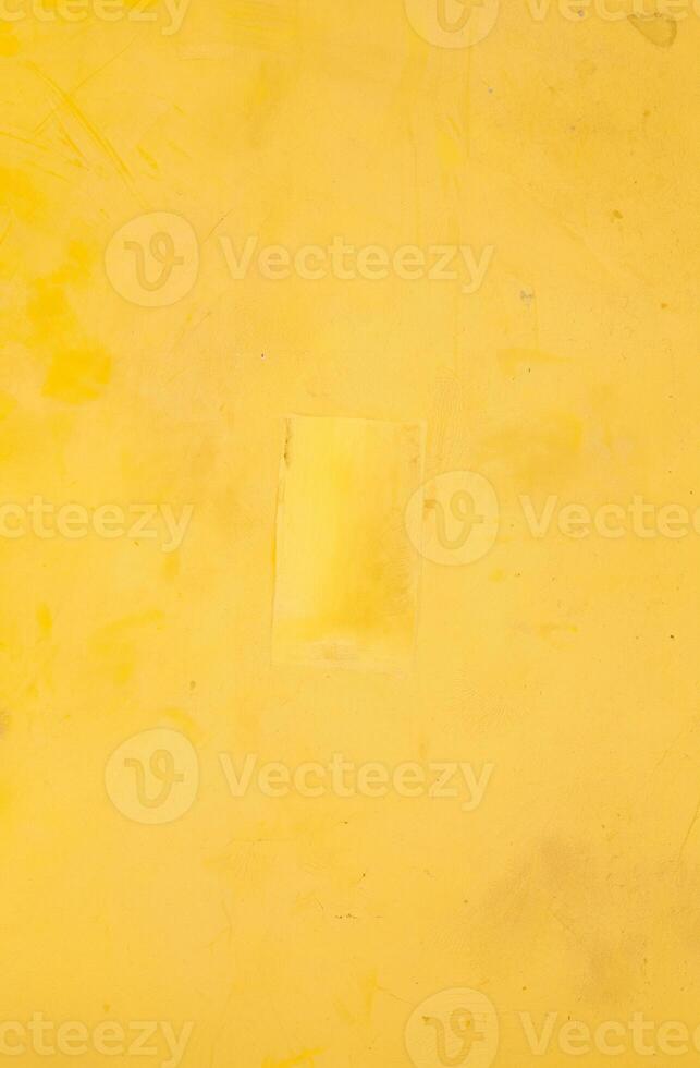 Bright Yellow Textured Surface with Subtle Marks and Scratches photo