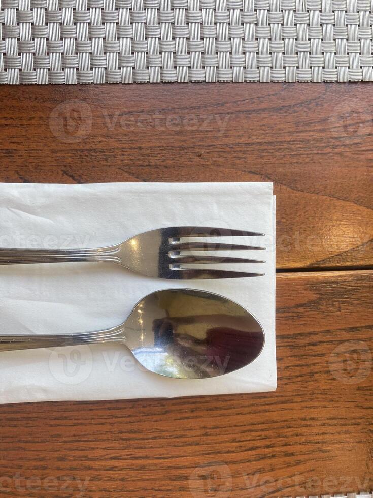 Fork and Spoon on a Napkin photo