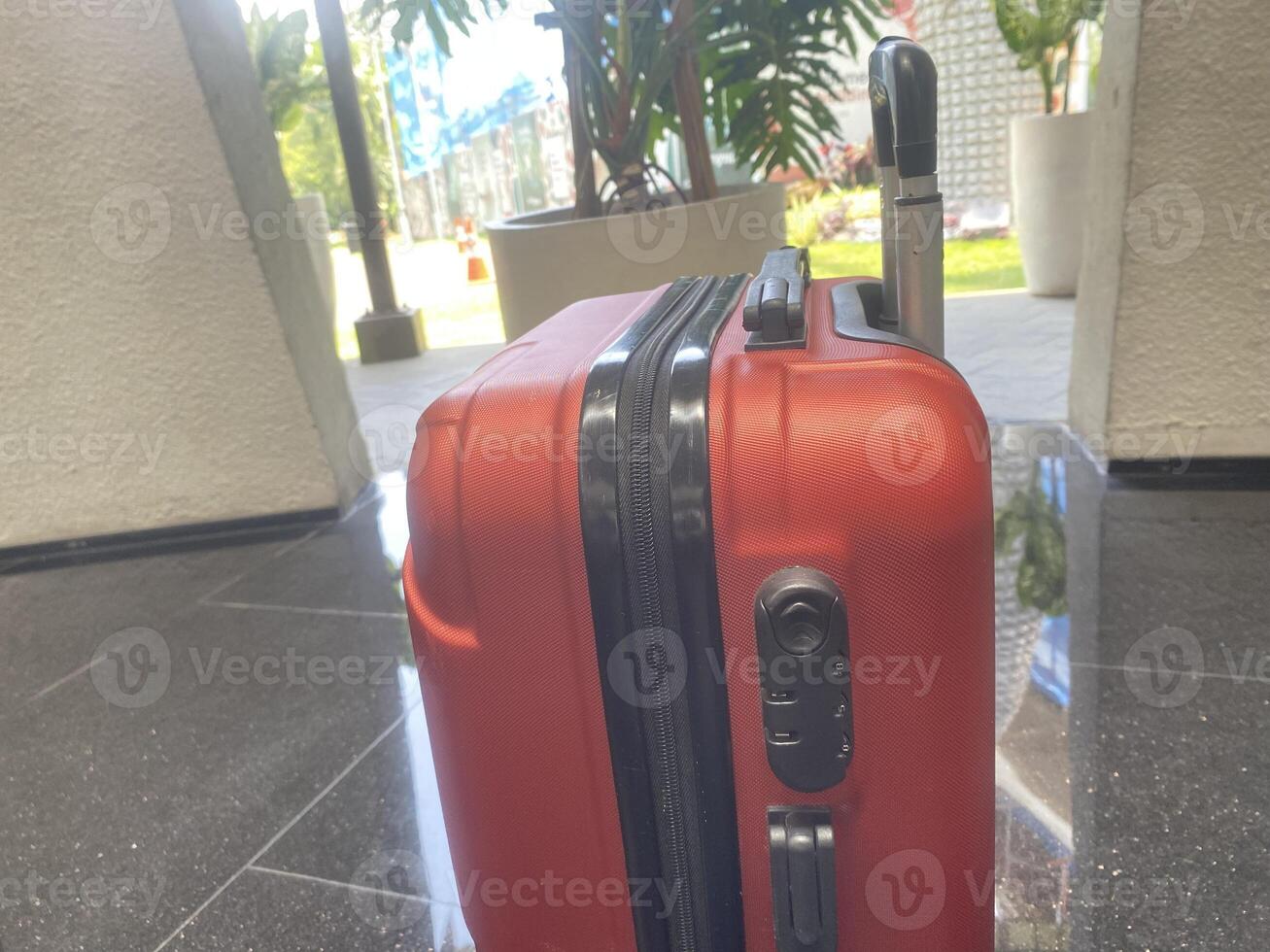 Red Suitcase In A Hotel Loby photo