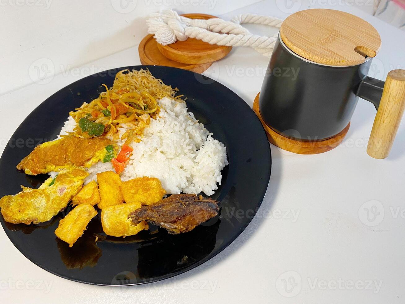 A delicious spread of Indonesian food for lunch photo