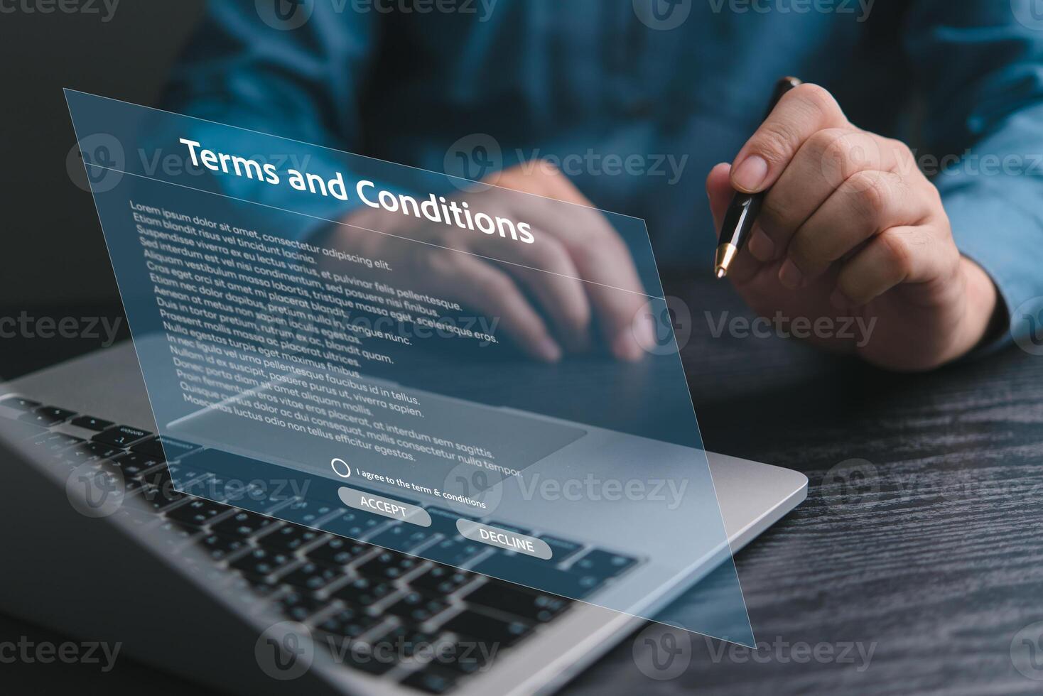 Hand signing digital terms and conditions document on laptop screen. Legal agreement, contract approval. Business technology concept. Online policy consent. photo