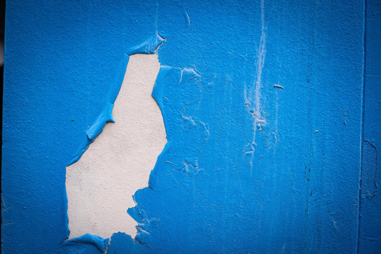 Close up blue painted cement texture background photo