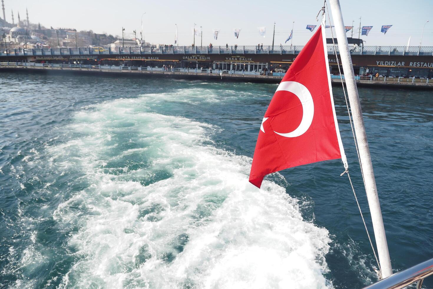 turkey istanbul 23 june 2024.viewed from a boat with Turkish flag photo