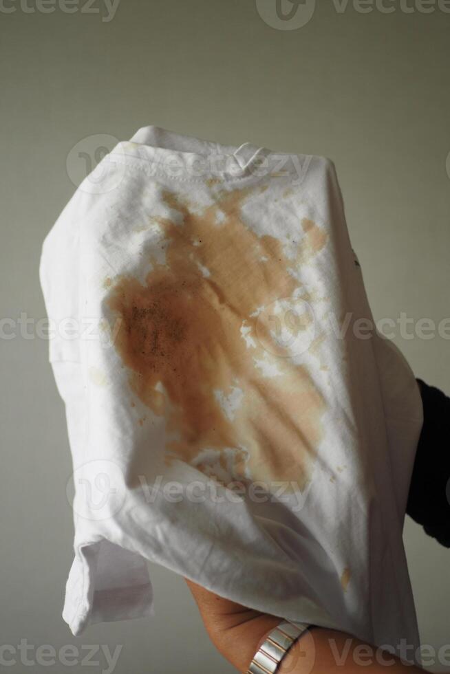 spilled coffee on a white shirt photo