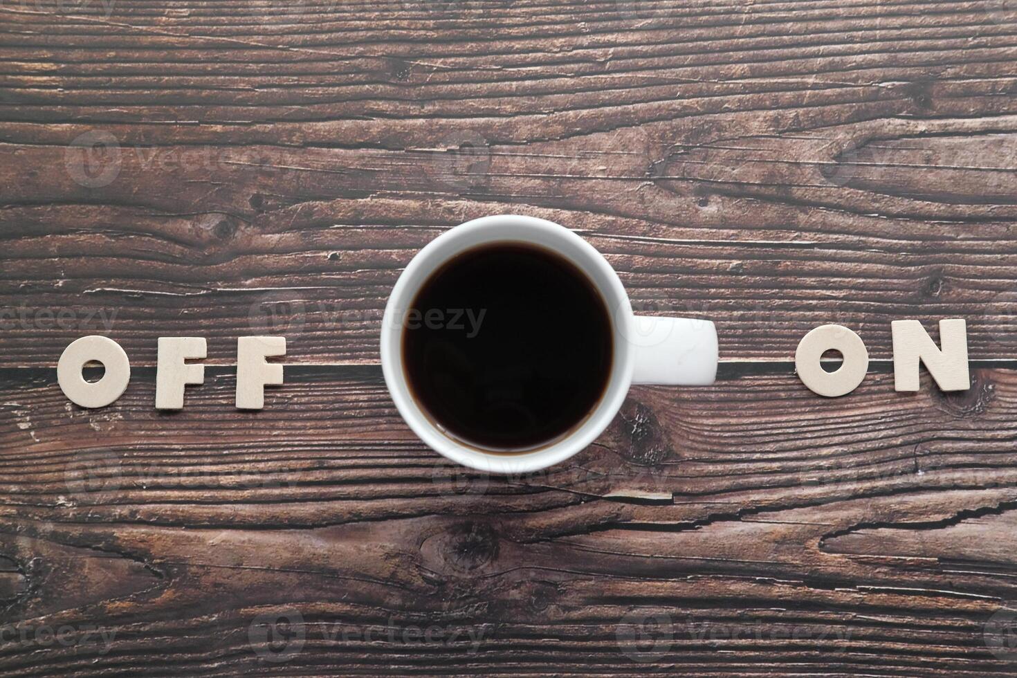 This unique Coffee Cup features an engaging design incorporating the words OFF and ON photo