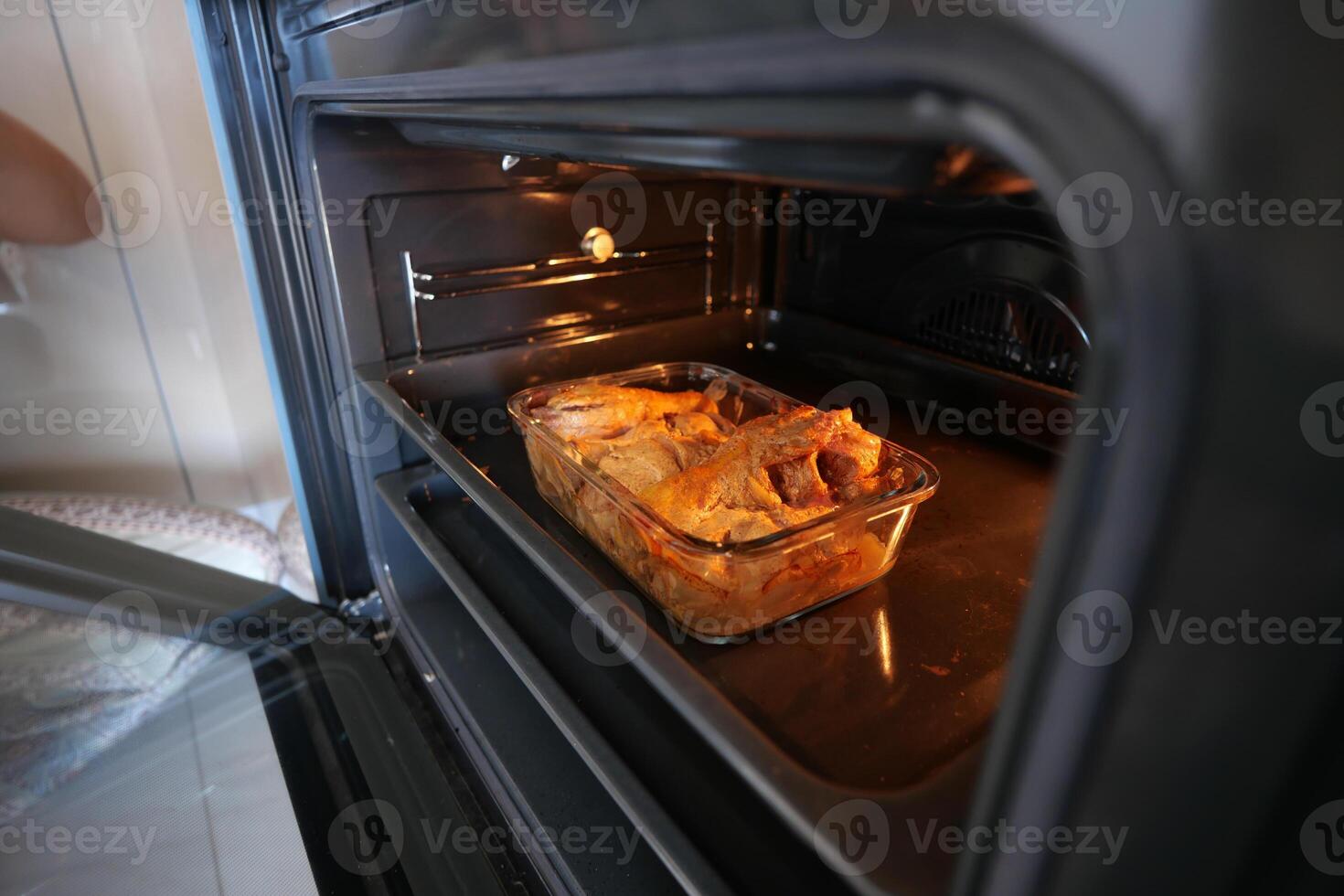 A Delicious Meal is Baking in the Oven A True Culinary Delight for Everyone to Enjoy photo