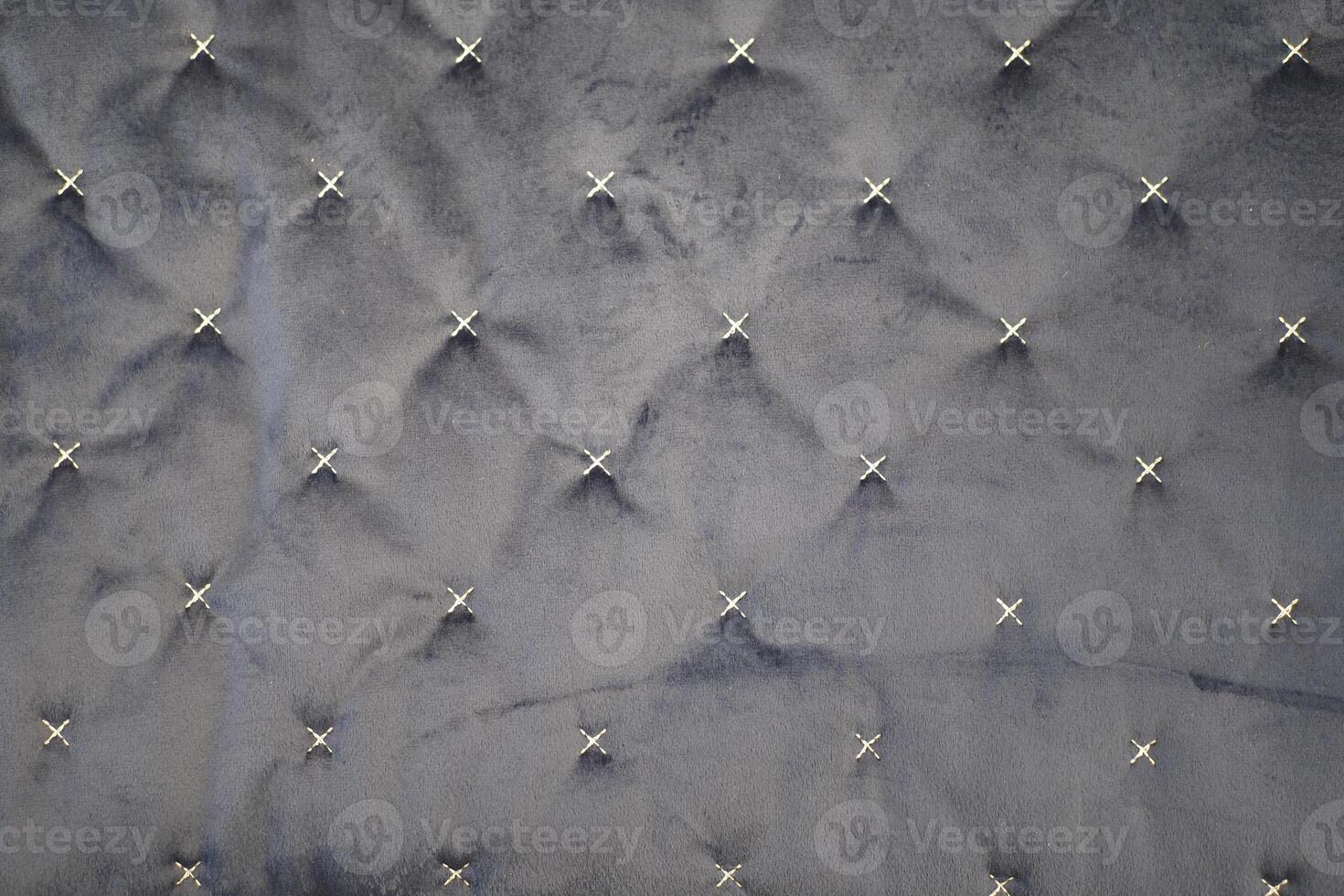 An Elegant Textured Fabric featuring Intricate Decorative Stitches for a stunning look photo