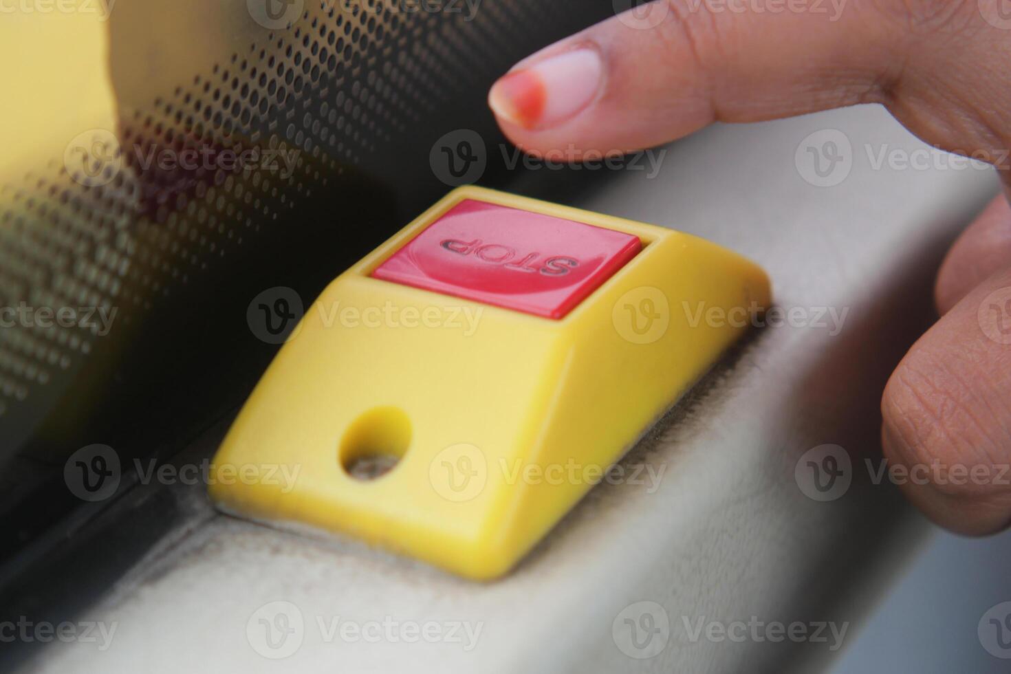 Closeup of Bus bell switch for stop inside the public bus photo
