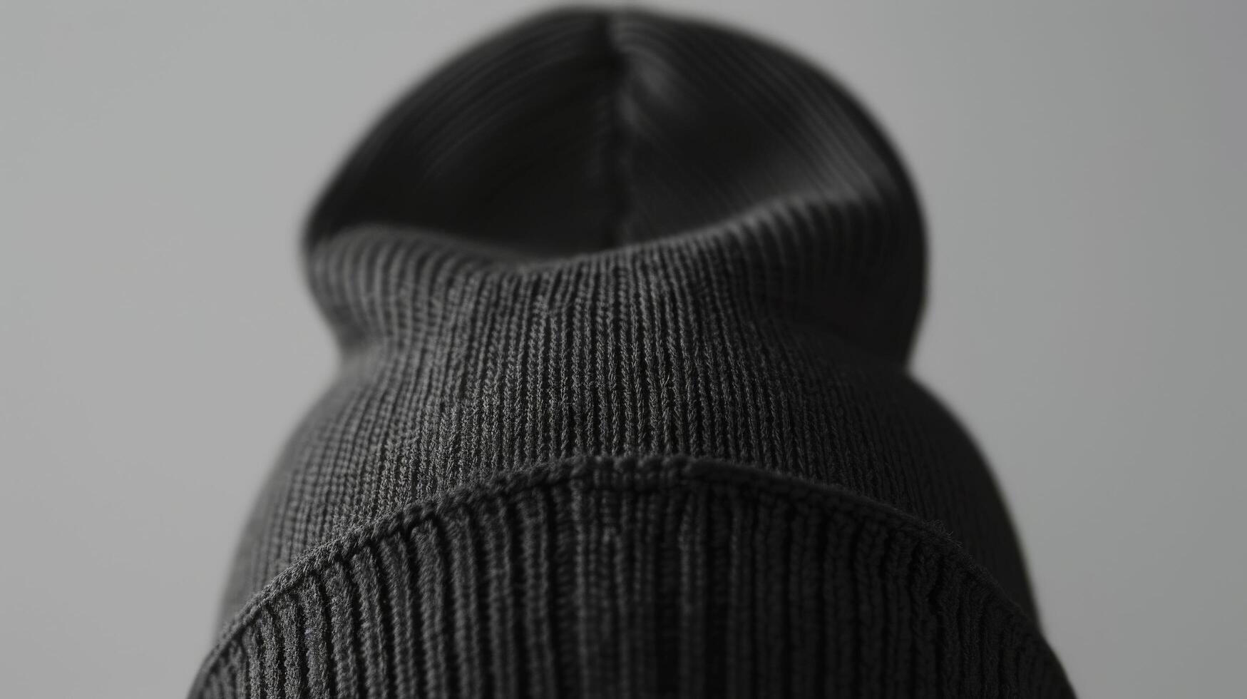 A close up of a black knit hat photo