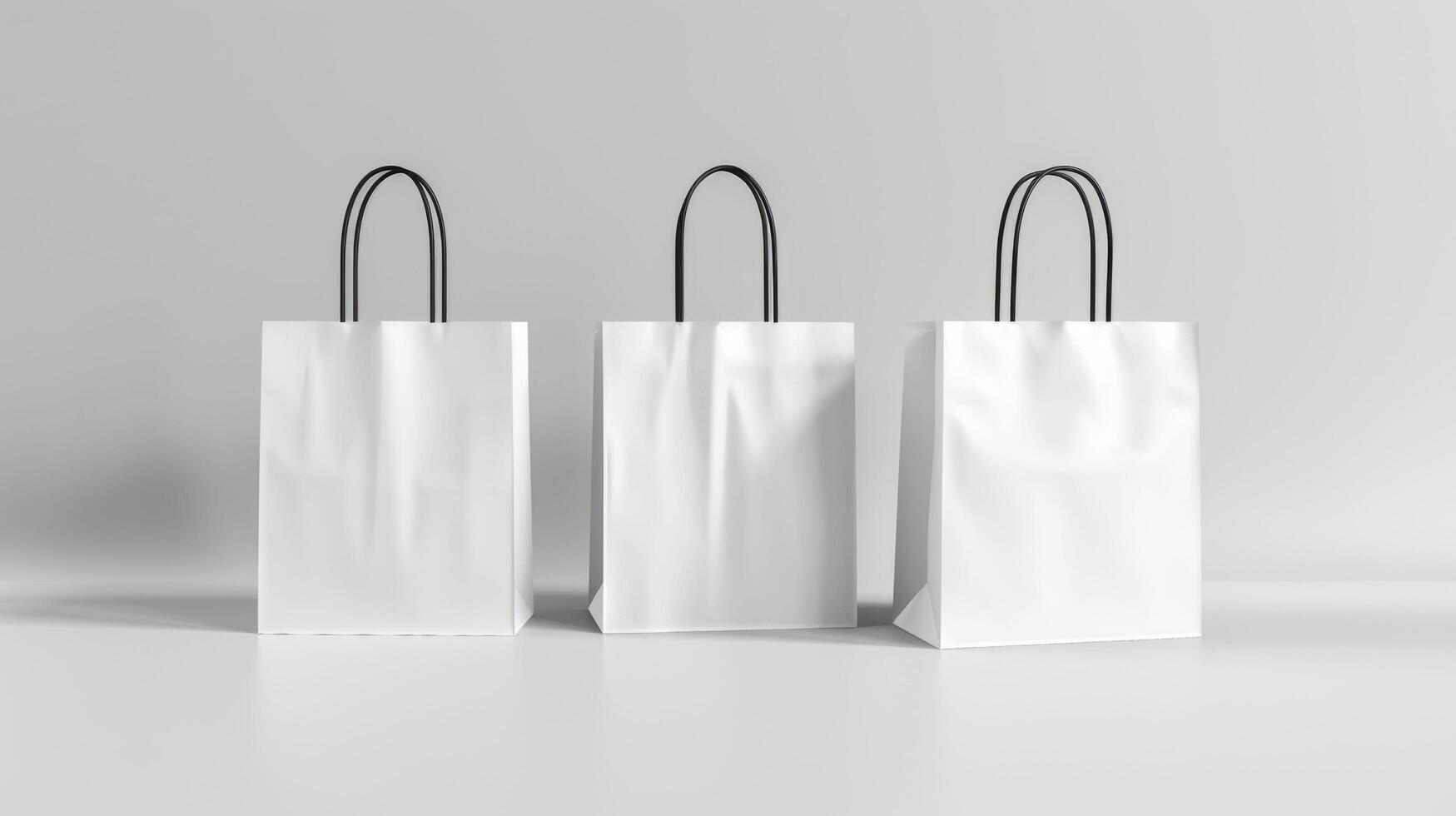 Three white bags with black handles are displayed on a white background photo