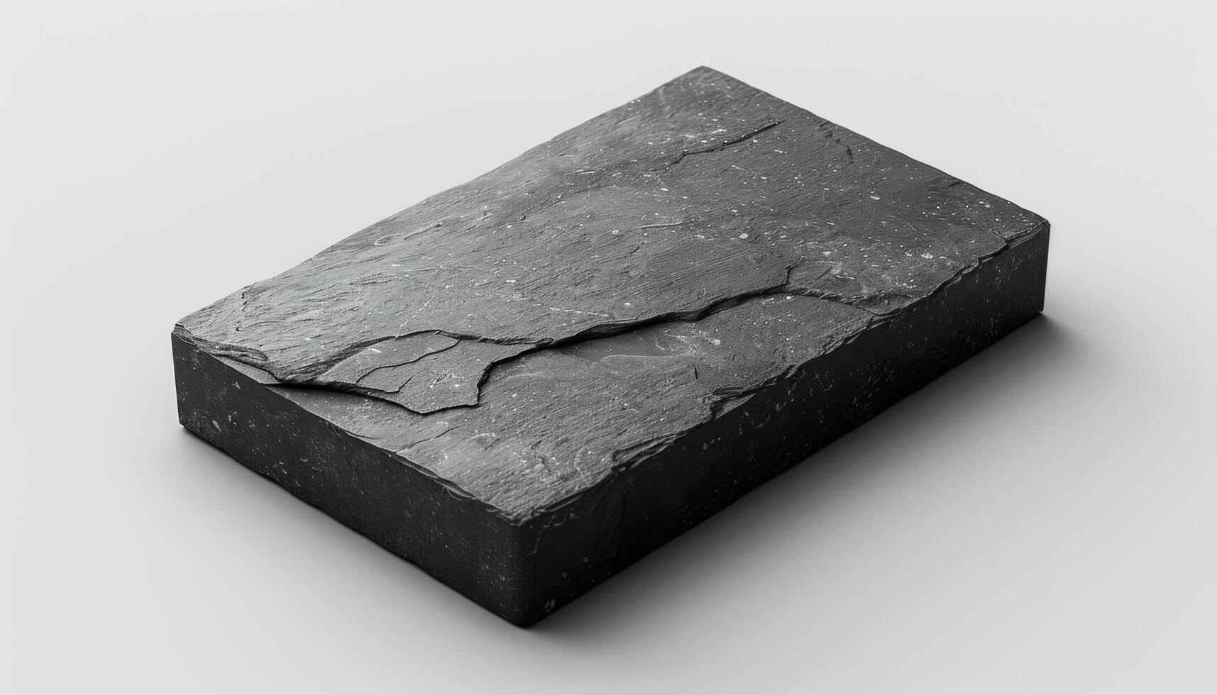 A black stone slab with a crack in it photo