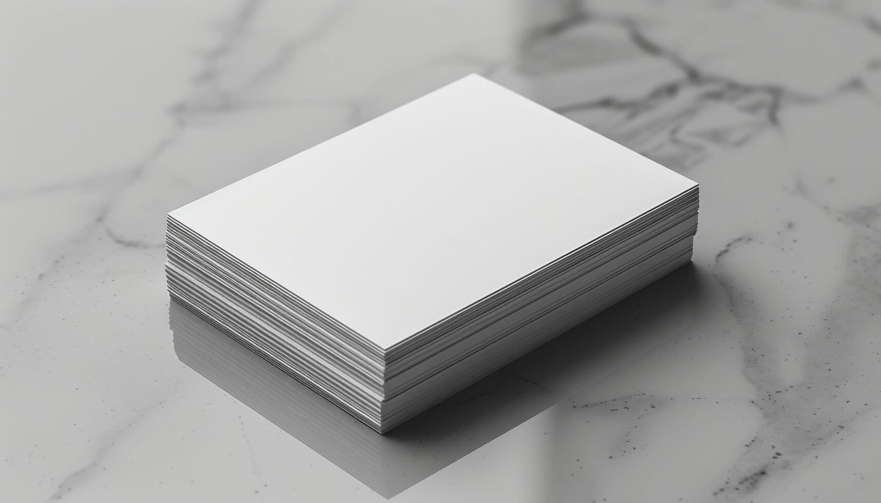 A stack of white papers on a marble countertop photo