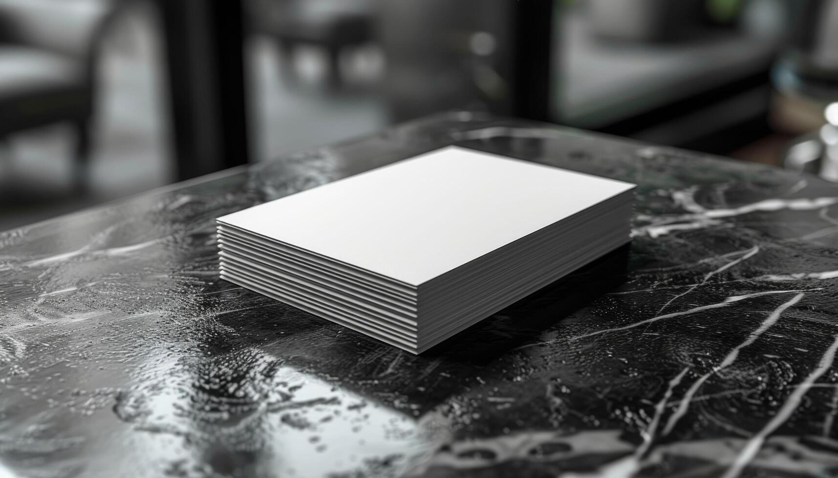 A stack of white papers is on a table photo