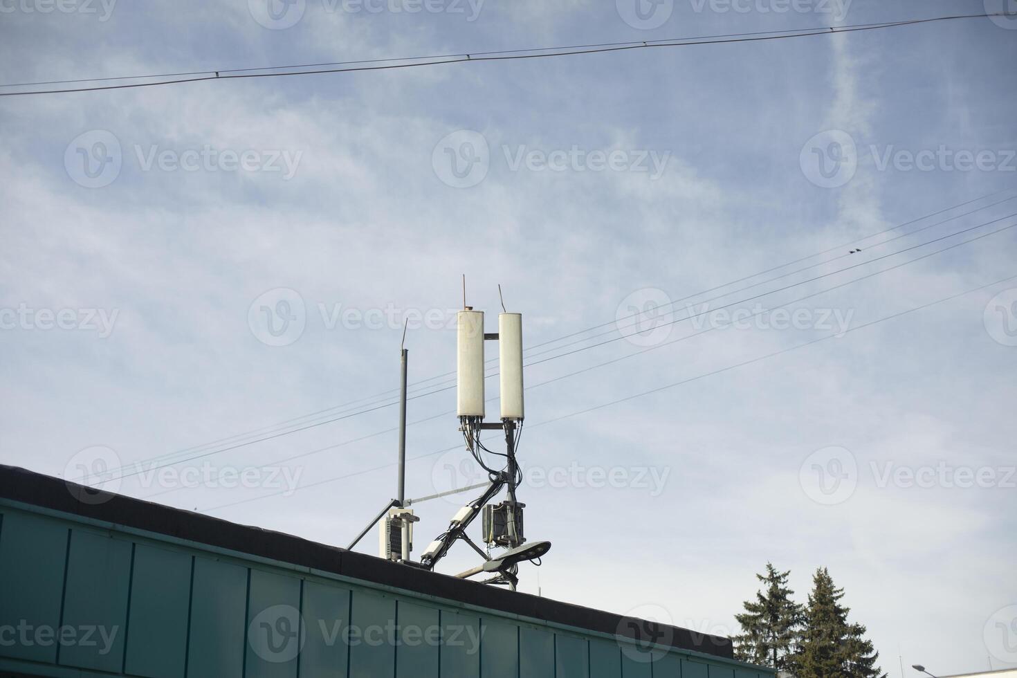Rooftop antennas. Radio communication on building. Signal transmission. photo