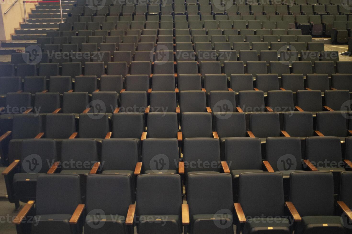 Empty seats in the auditorium. Seats for spectators. Rows of seats. photo