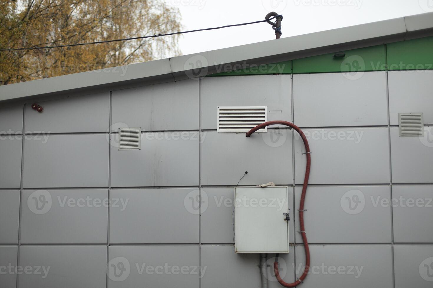 Equipment on building. Building in city. Technical structure. Ventilation system. photo