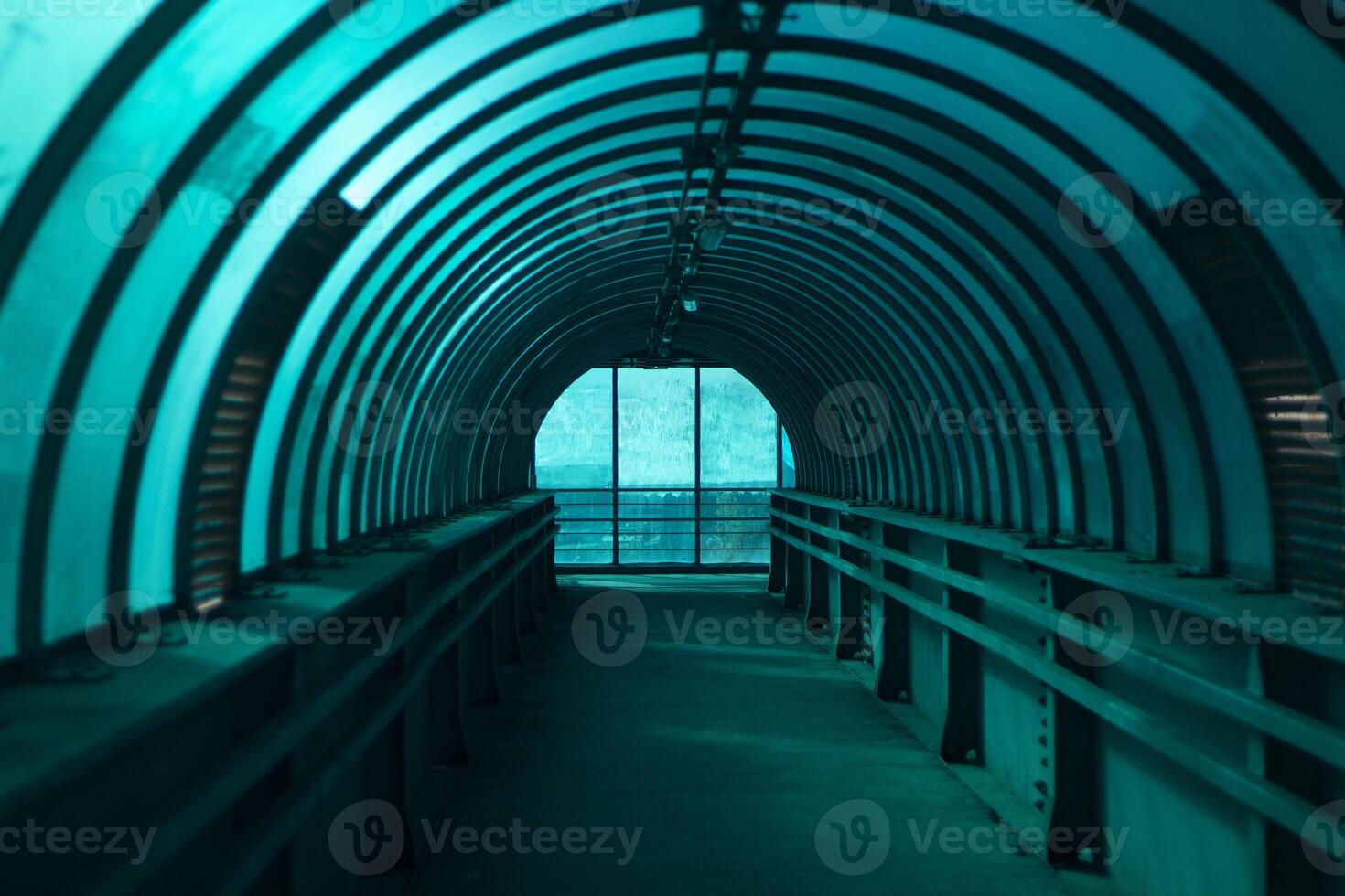 Spherical tunnel. Closed bridge over the road. Crosswalk. photo
