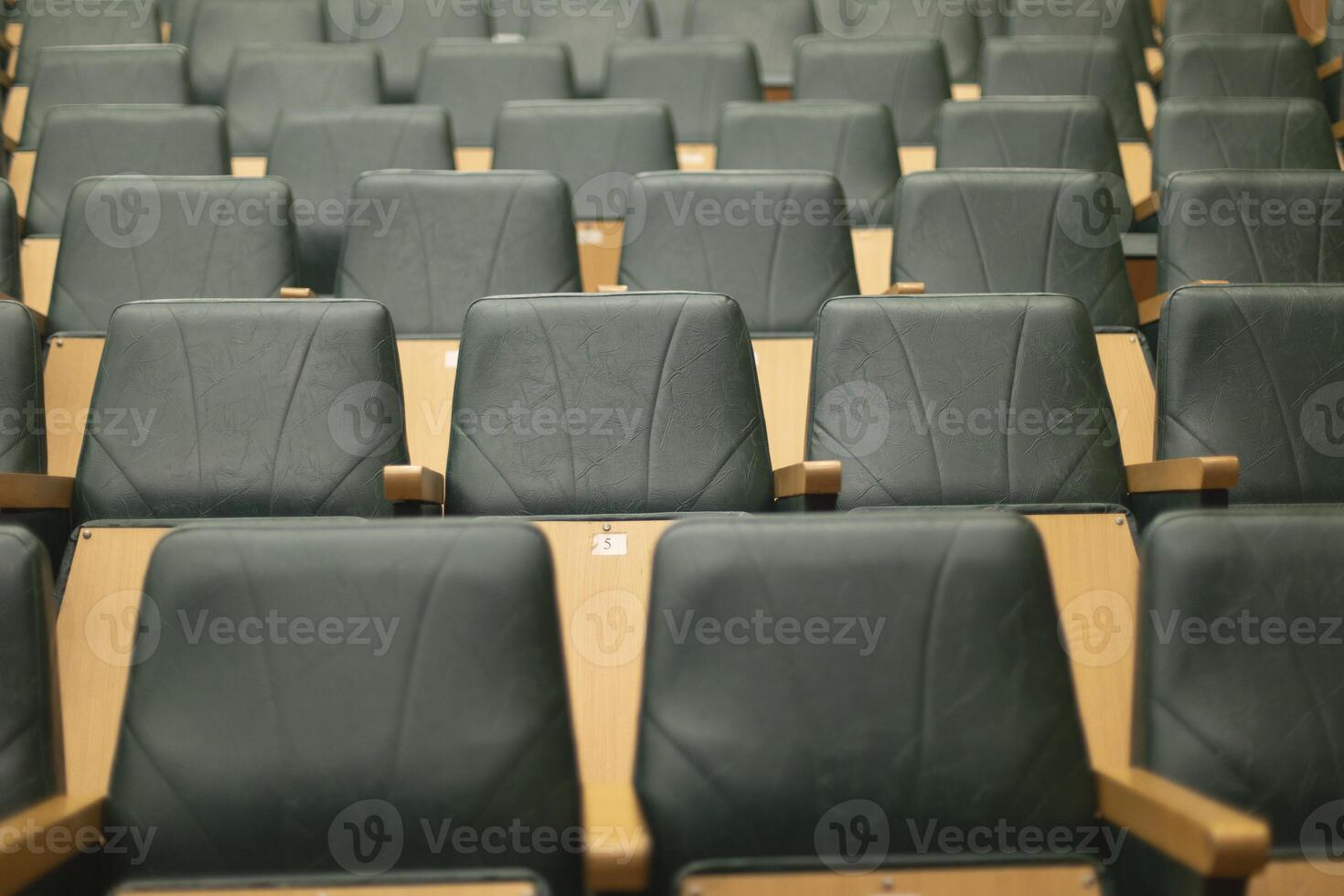 Empty seats in hall. Rows of seats. Classroom for students. photo