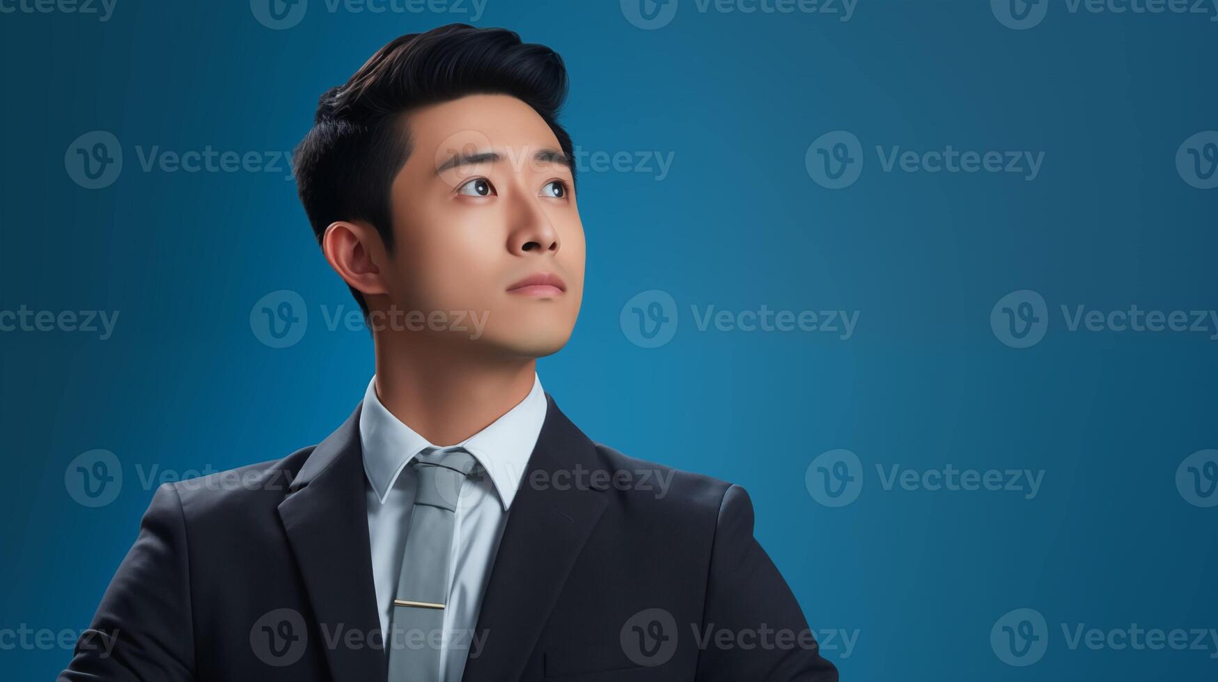 Confident filipino businessman gazes upward with determination image copy space. Asian male executive leader banner background blurred. Ambition leadership concept photography copyspace photo