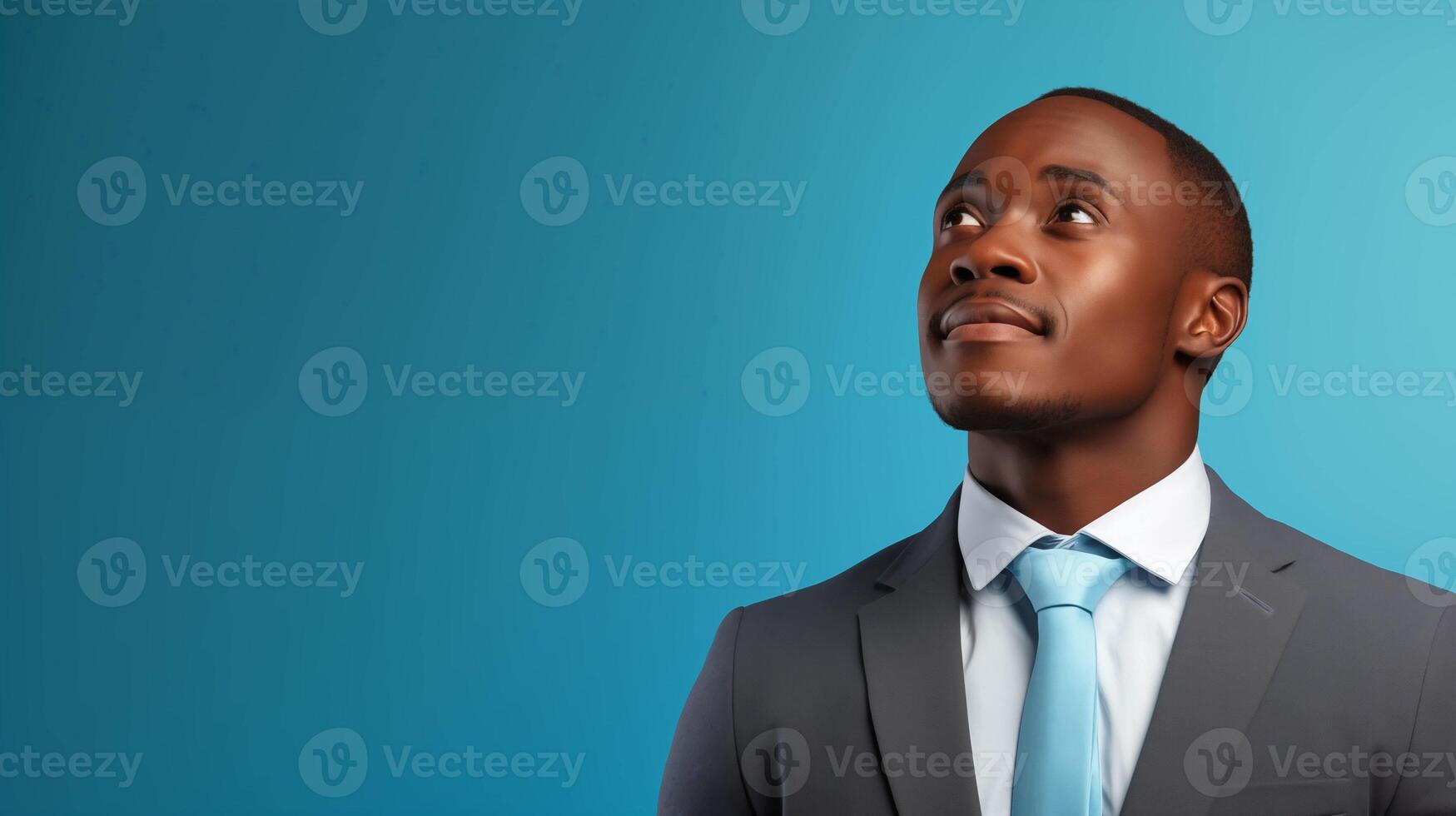Black man wearing suit looks up with confident expression image copy space. African american businessman banner background. Career aspirations success concept photography copyspace photo
