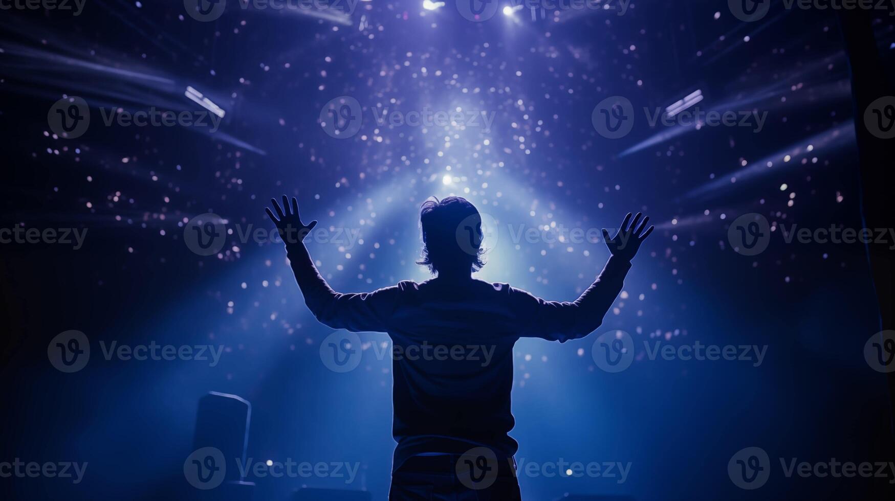 Performer reaching out to audience under bokeh lights image. Stage lighting creating magical atmosphere photography scene wallpaper. Showmanship artistry concept photorealistic photo