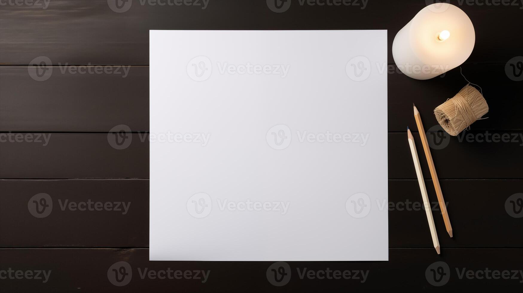 White card mockup with candle pencils spool of twine on dark desk. Candlelight natural materials template advertising image. Creative artistic project mock up product photorealistic photo