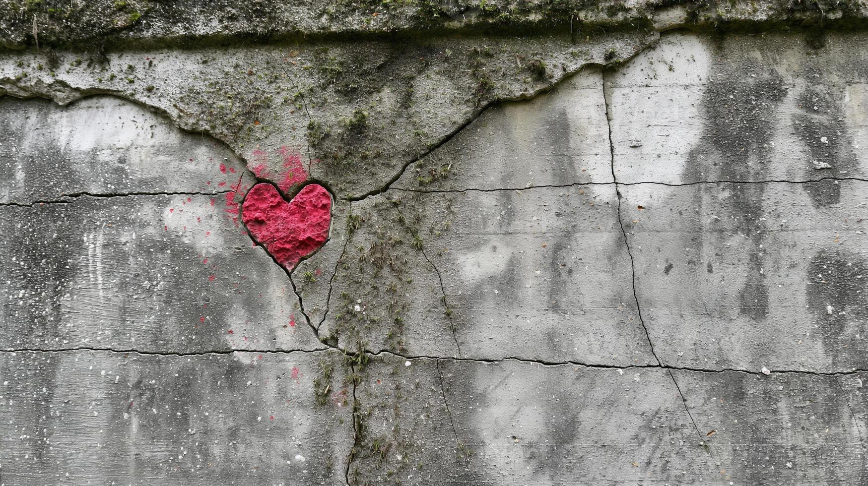 Weathered concrete wall with red heart within deep crack background image. Rough aged surface vibrant heart photo backdrop wallpaper realistic. Love amidst decay concept photorealistic