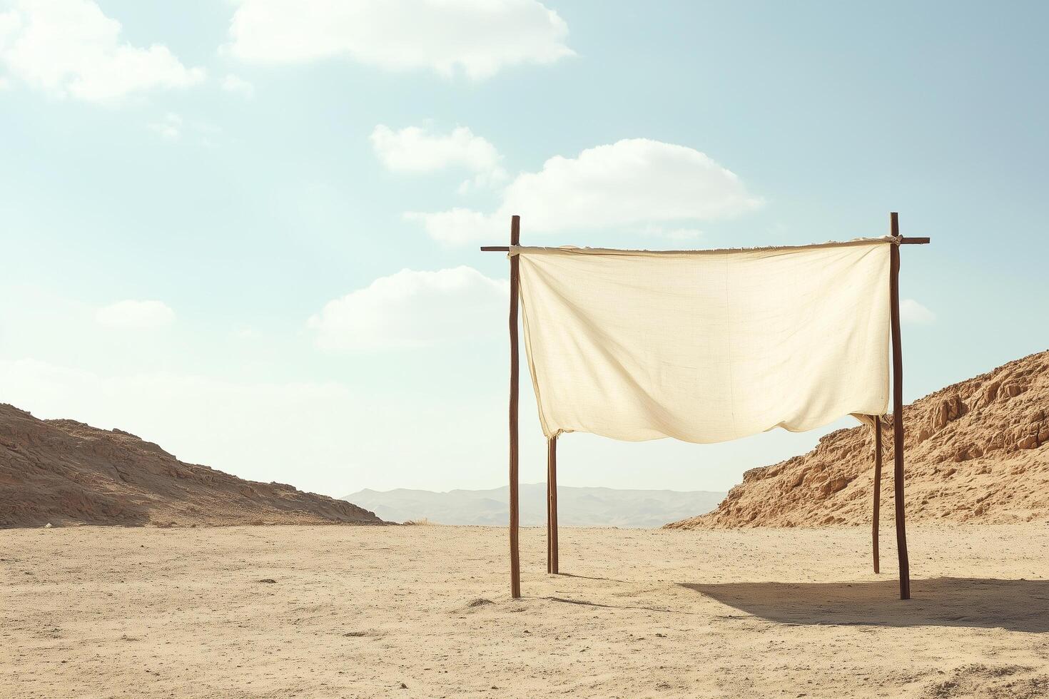 White canvas hanging in the desert on a sunny day sukkah photo