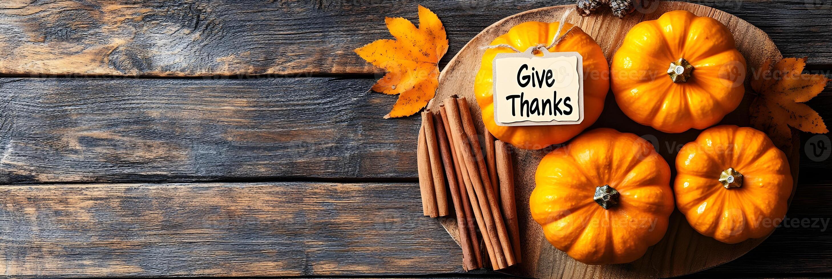 Autumn Thanksgiving Pumpkins Cinnamon Sticks and Fall Leaves photo