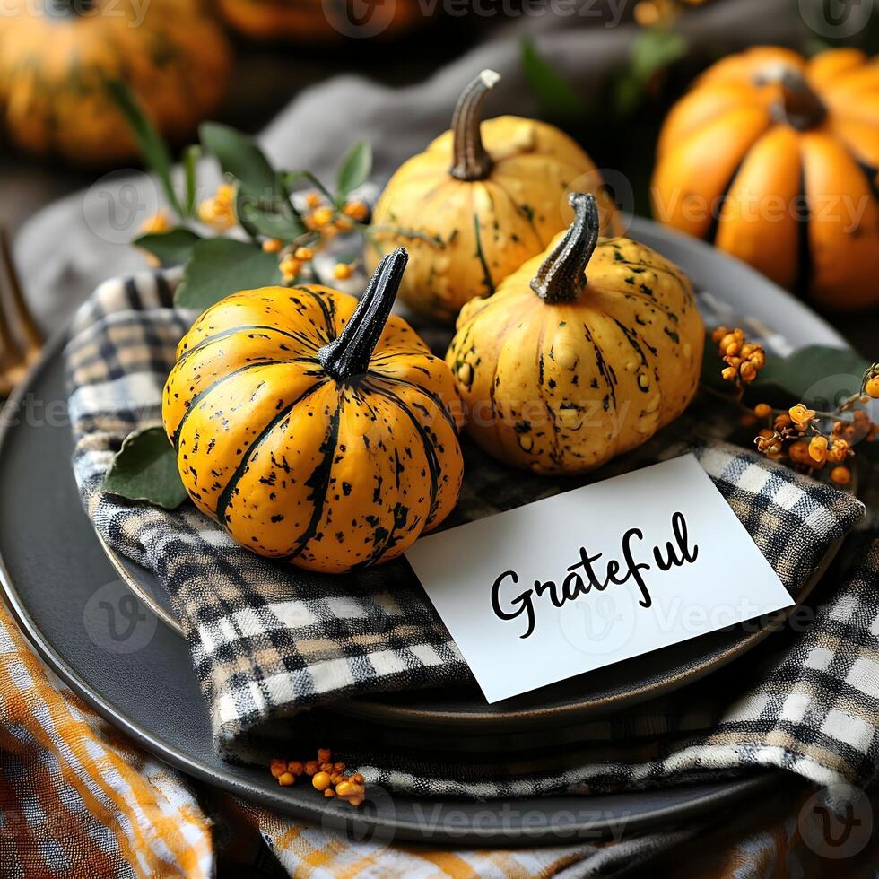 Autumn Thanksgiving Table Setting with Pumpkins and Grateful Sign photo