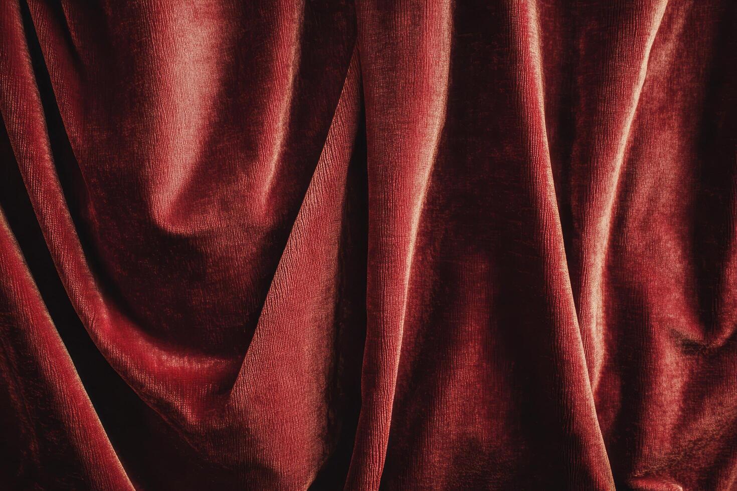 Close-up of Red Velvet Fabric Draped in Soft Folds photo