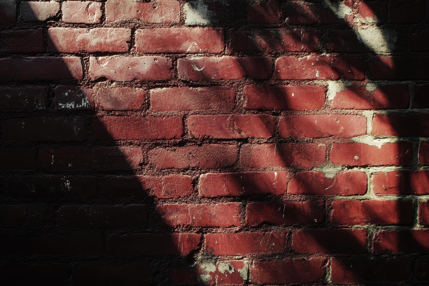 Red Brick Wall with Sunlight and Shadow Patterns photo