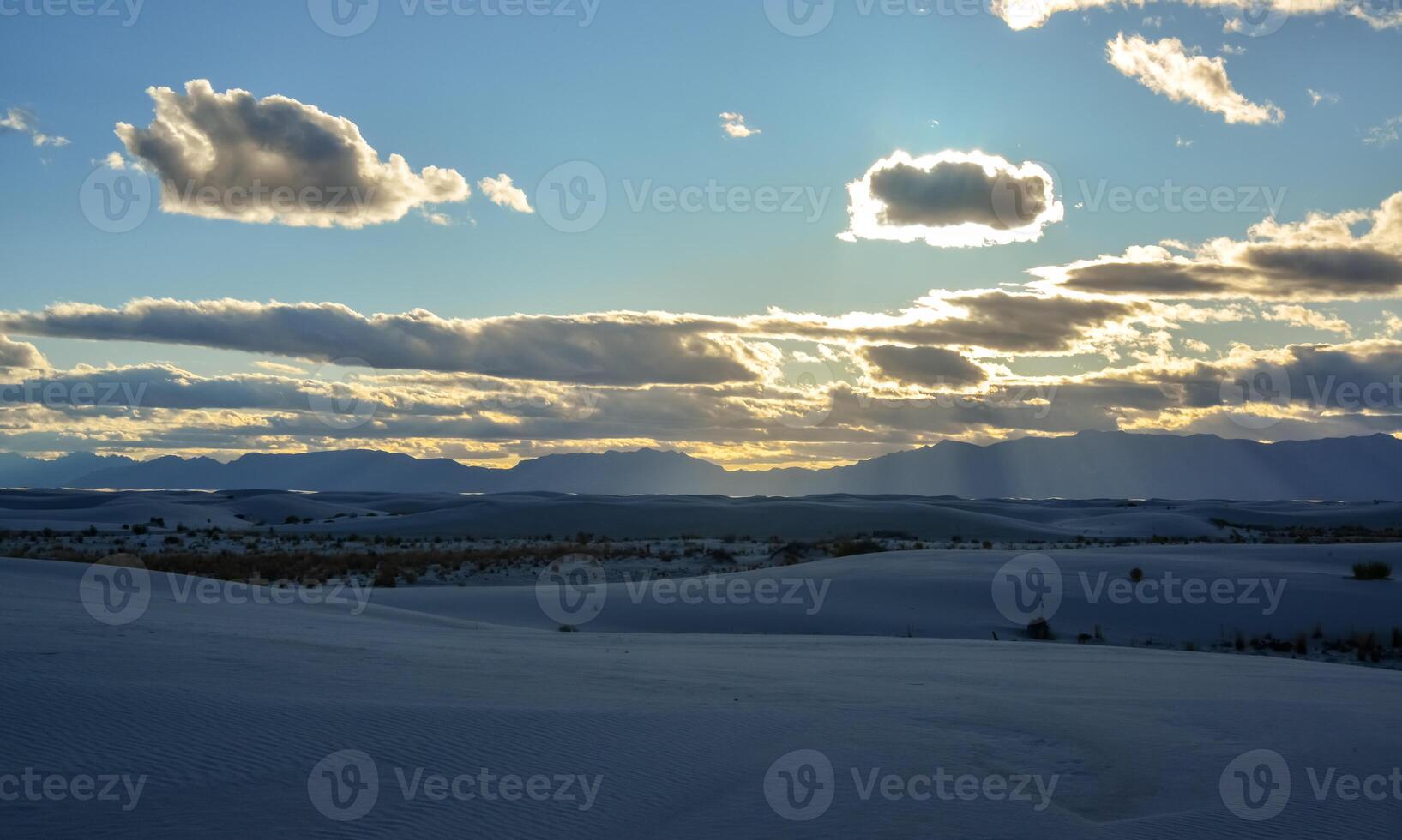 White clouds during sunset over White Sands in New Mexico, USA photo