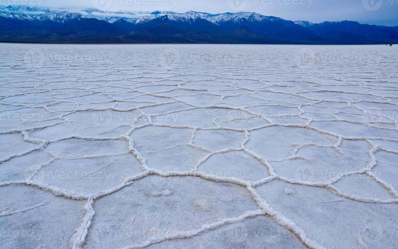 Death Valley National Park, Salt with clay, California. Smooth salt valley with cracked and swollen salt, dead salt landscape photo