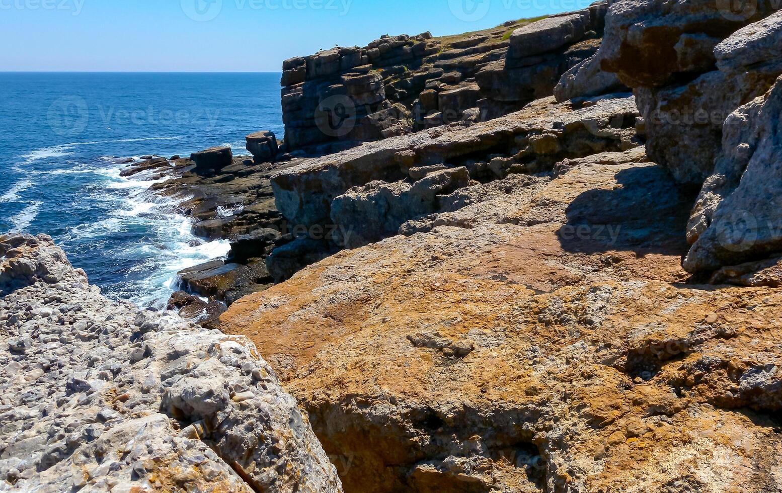 Coastal cliffs from the north side of Serpent's -Zmeinyi- Island, Ukraine photo
