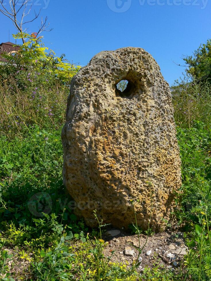 Ancient artifact, an ancient stone anchor, raised from the bottom of the Black Sea near Sozopol, Bulgaria photo