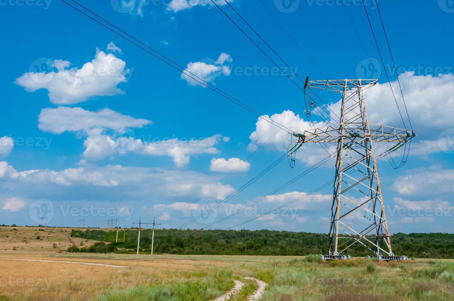High-voltage power line against the background of the blue sky photo