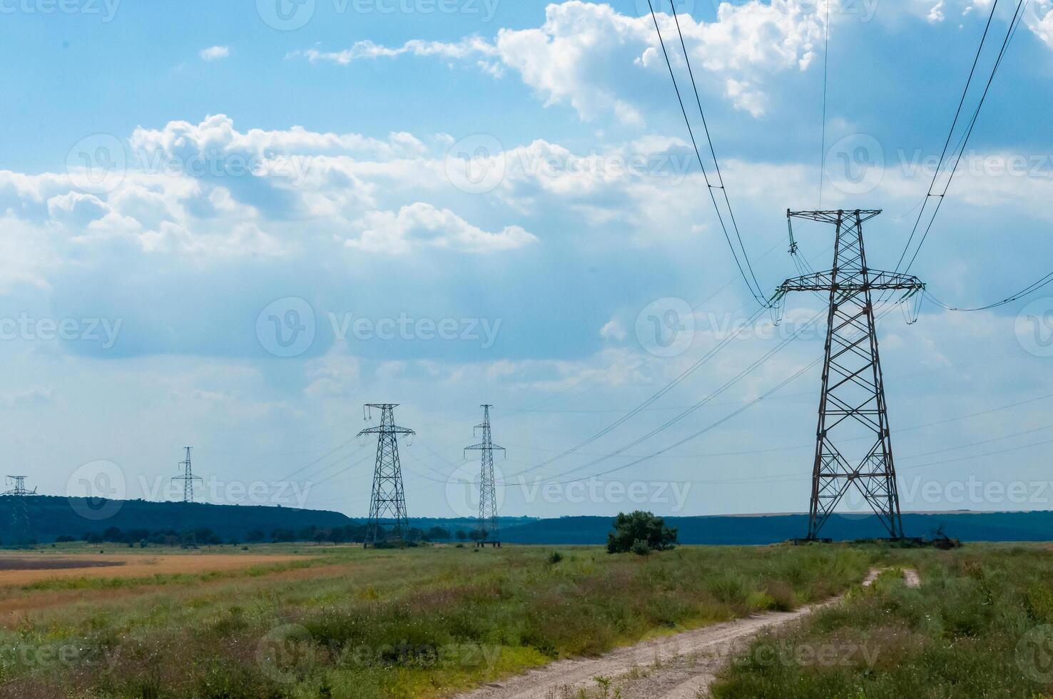 High-voltage power line against the background of the blue sky photo