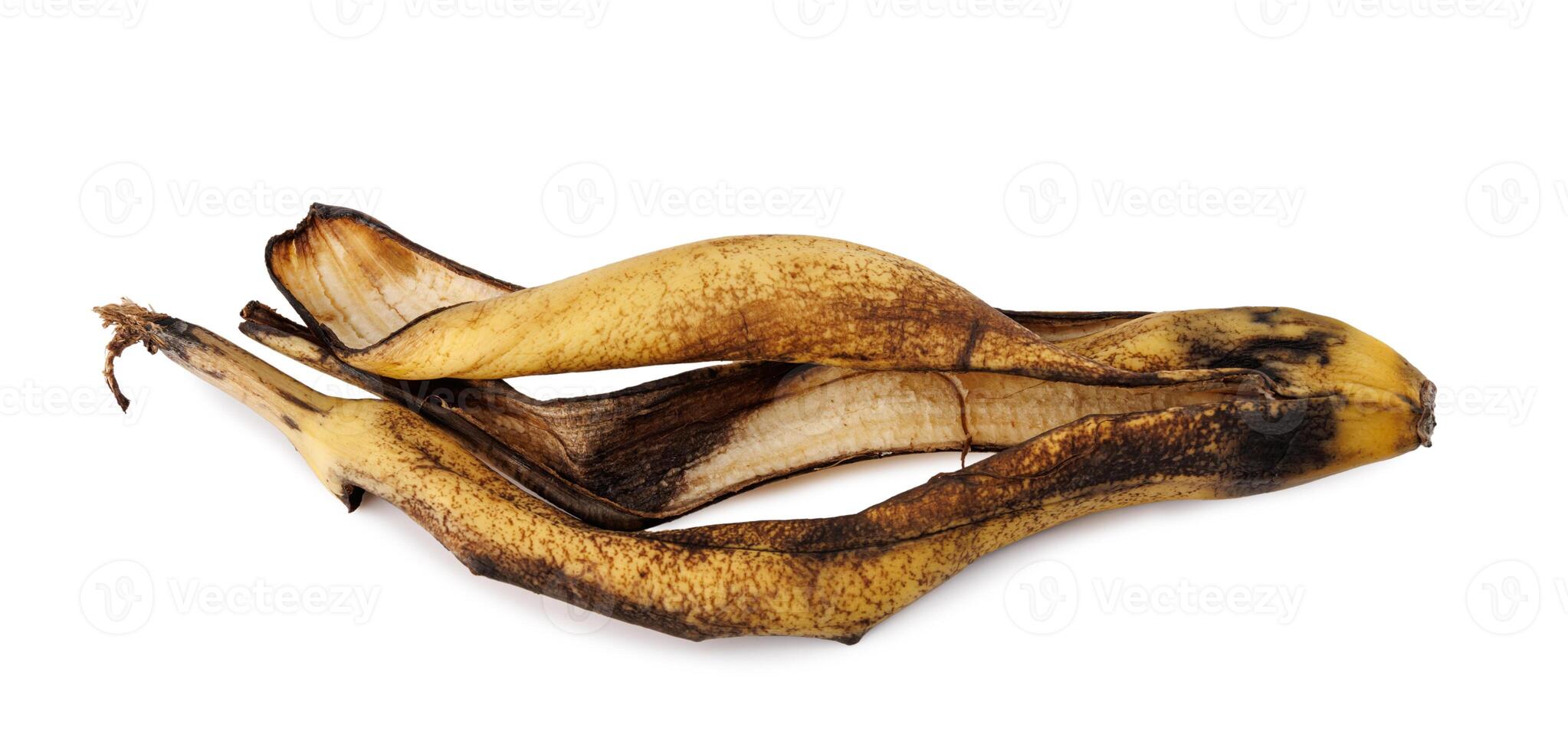 Banana peel isolated on white background. Blackened banana peel. Overripe banana. photo