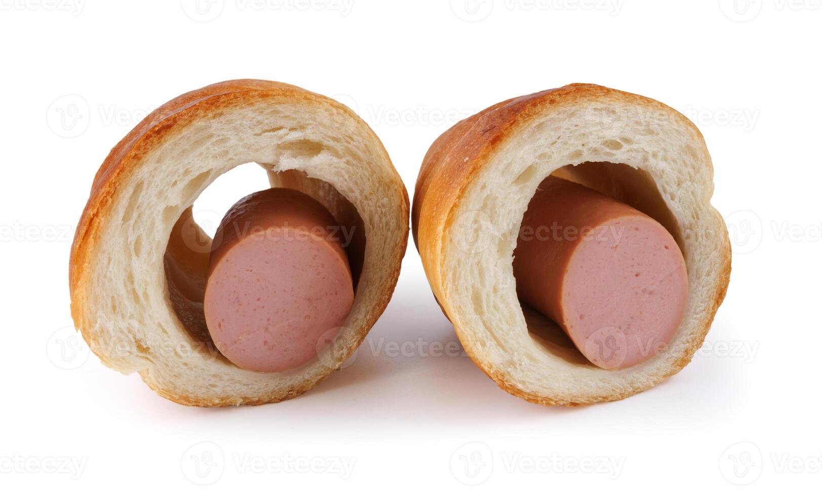 Sausage cut in half in dough isolated on a white background. photo