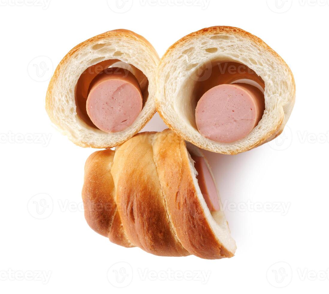 Sausages in dough cut in half isolated on a white background.Sausage in dough. photo