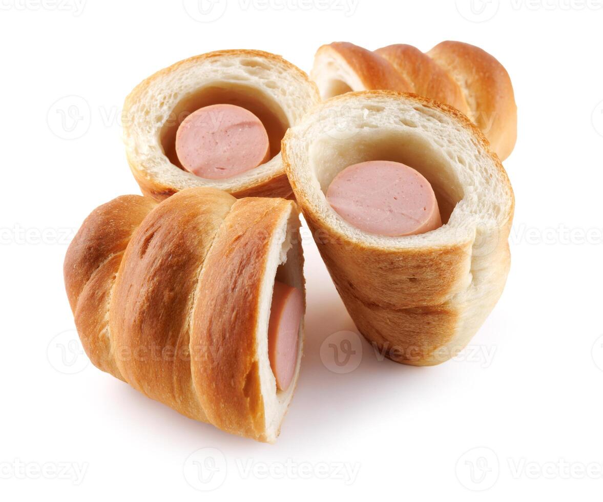 Sausages in dough cut in half isolated on a white background.Sausage in dough. photo