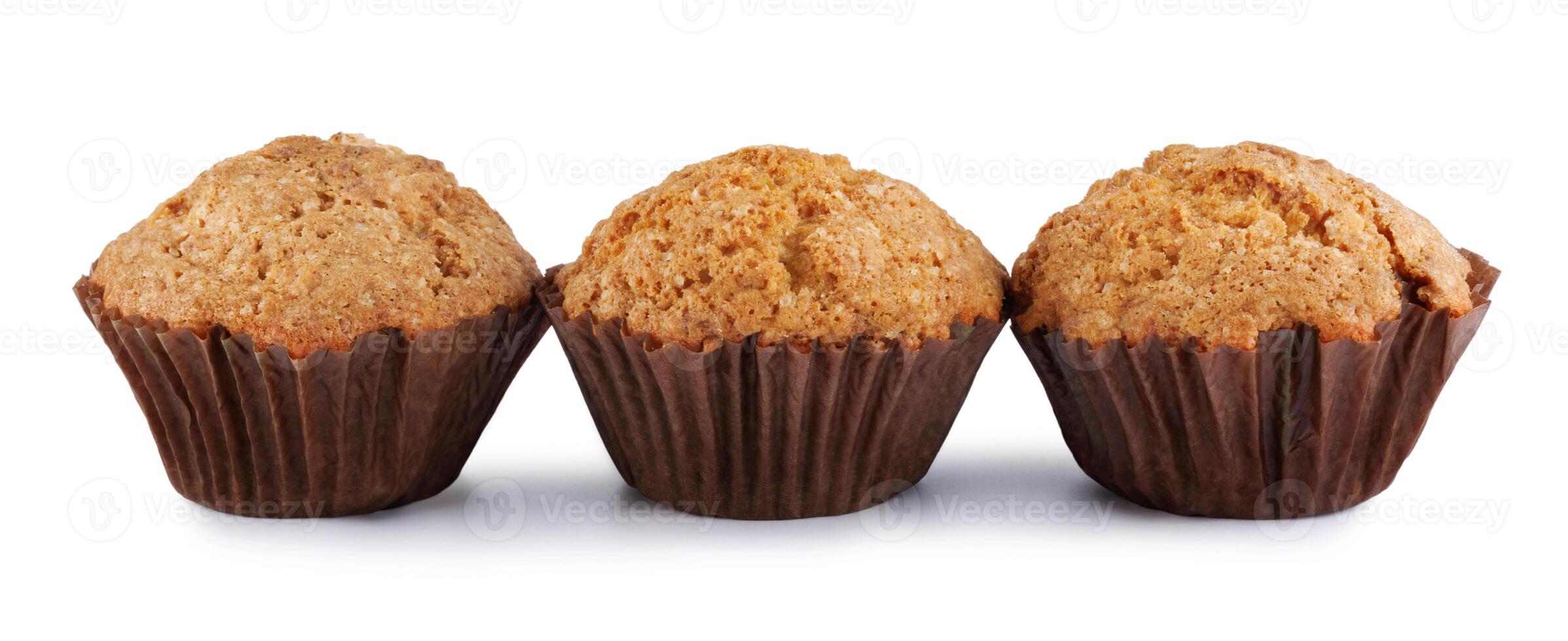 Three muffins isolated on a white background. photo