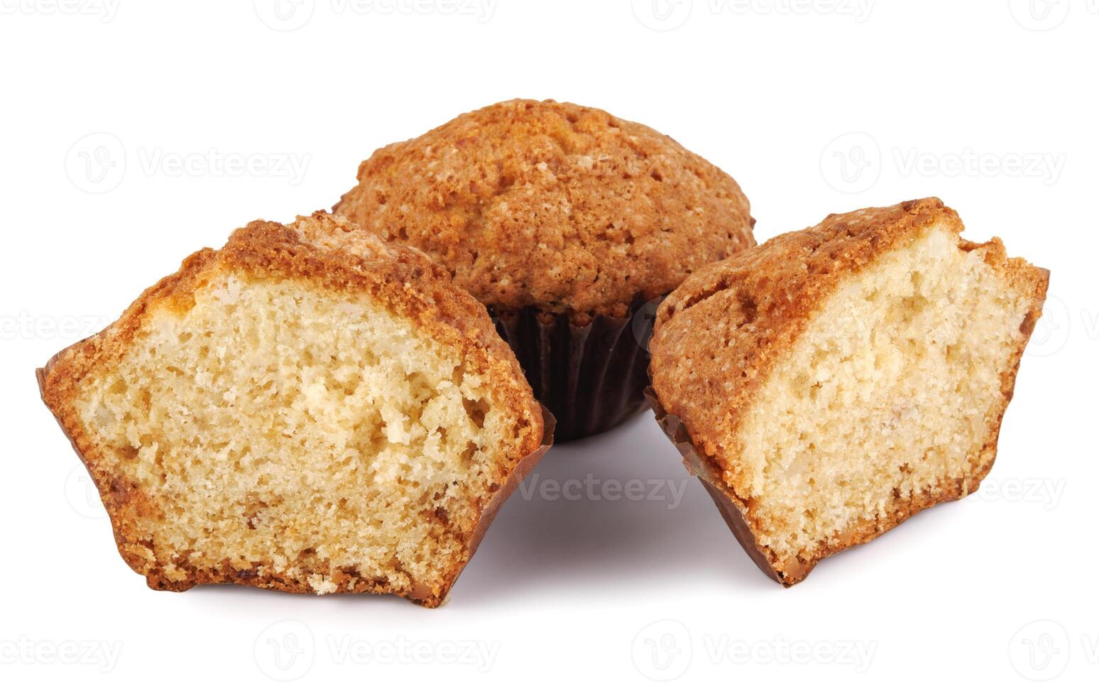 Whole and half muffin isolated on white background. photo