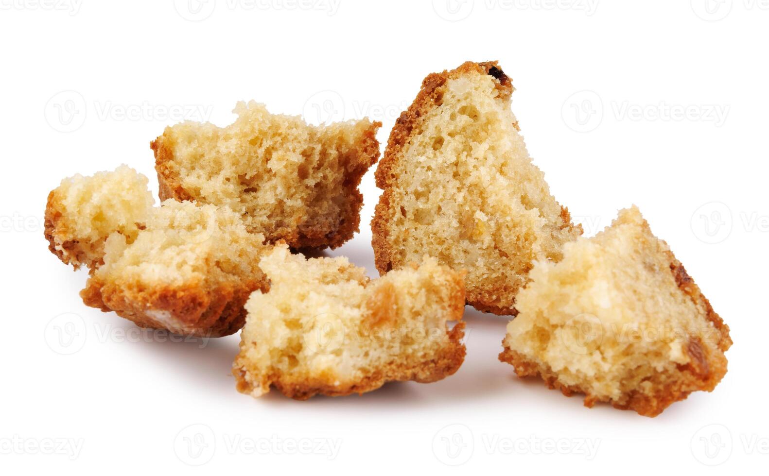 Muffin crumbled into pieces isolated on a white background. photo