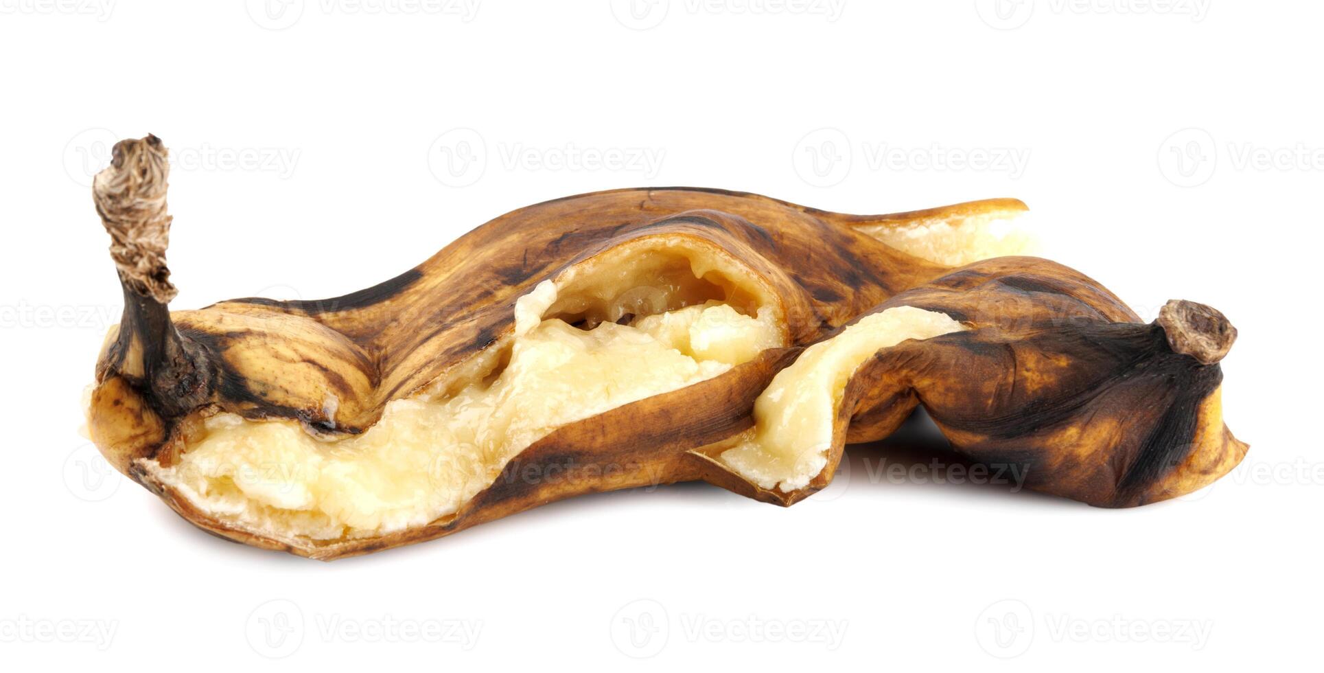 Crushed overripe banana isolated on a white background. photo
