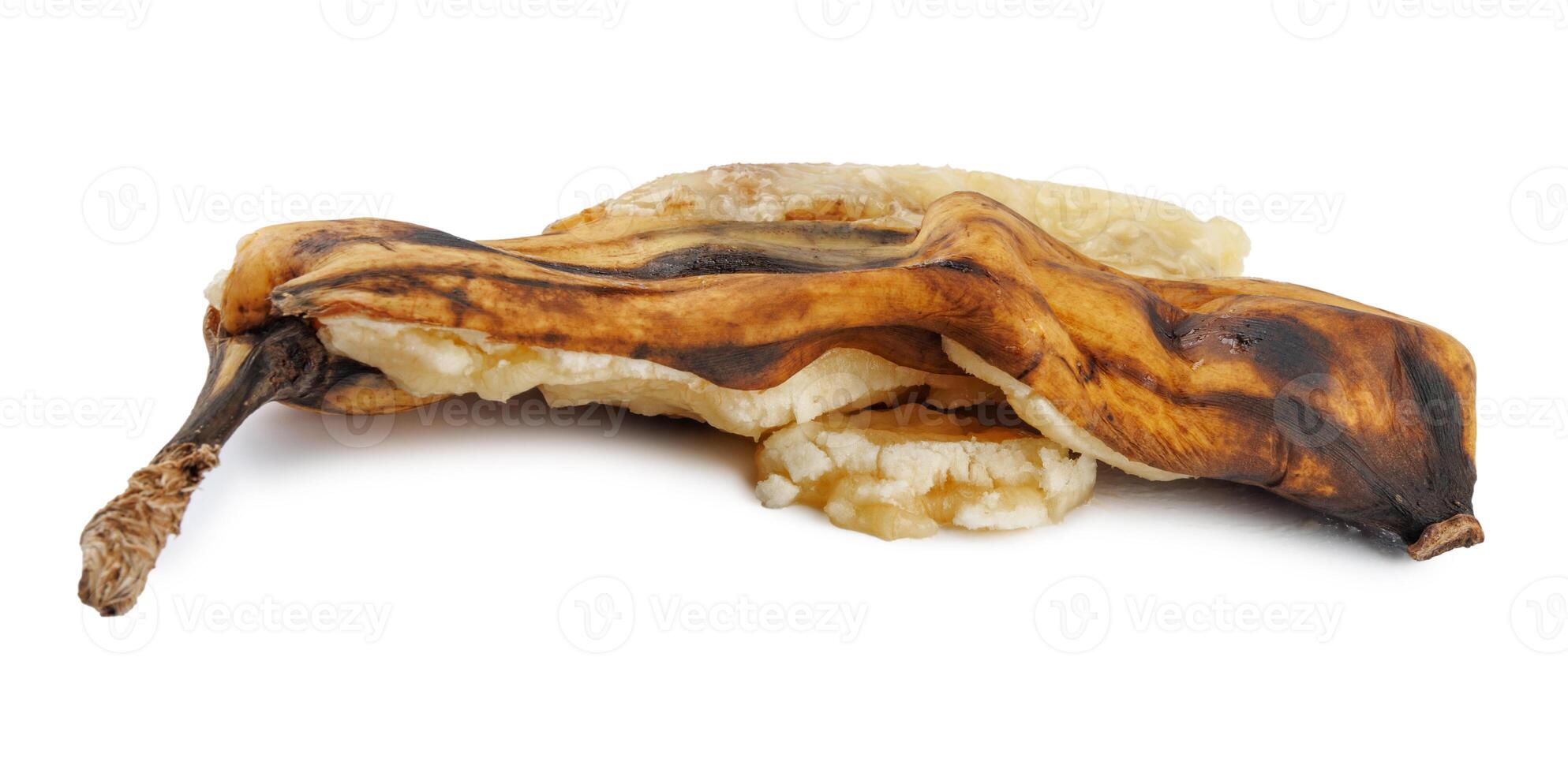 Crushed overripe banana isolated on a white background. photo