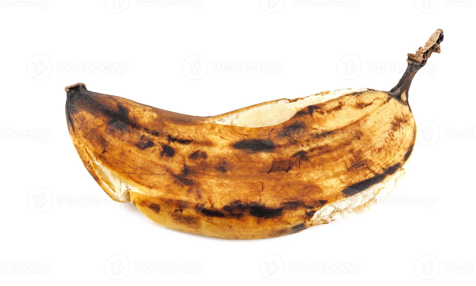 Crushed overripe banana isolated on a white background. photo