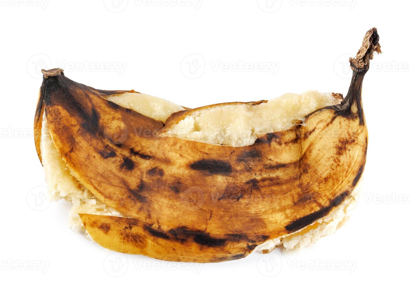 Crushed overripe banana isolated on a white background. photo