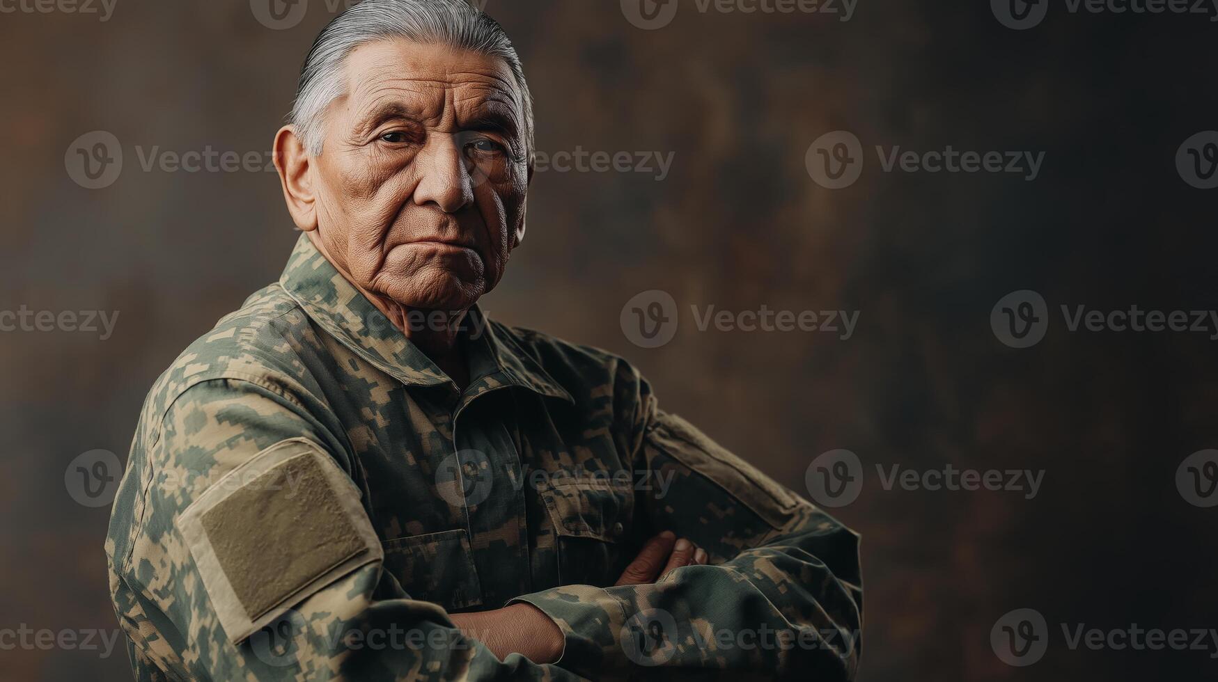 Proud Elderly Veteran in Camouflage Uniform with Folded Arms and Serious Expression on Dark Background for Stock Photography photo